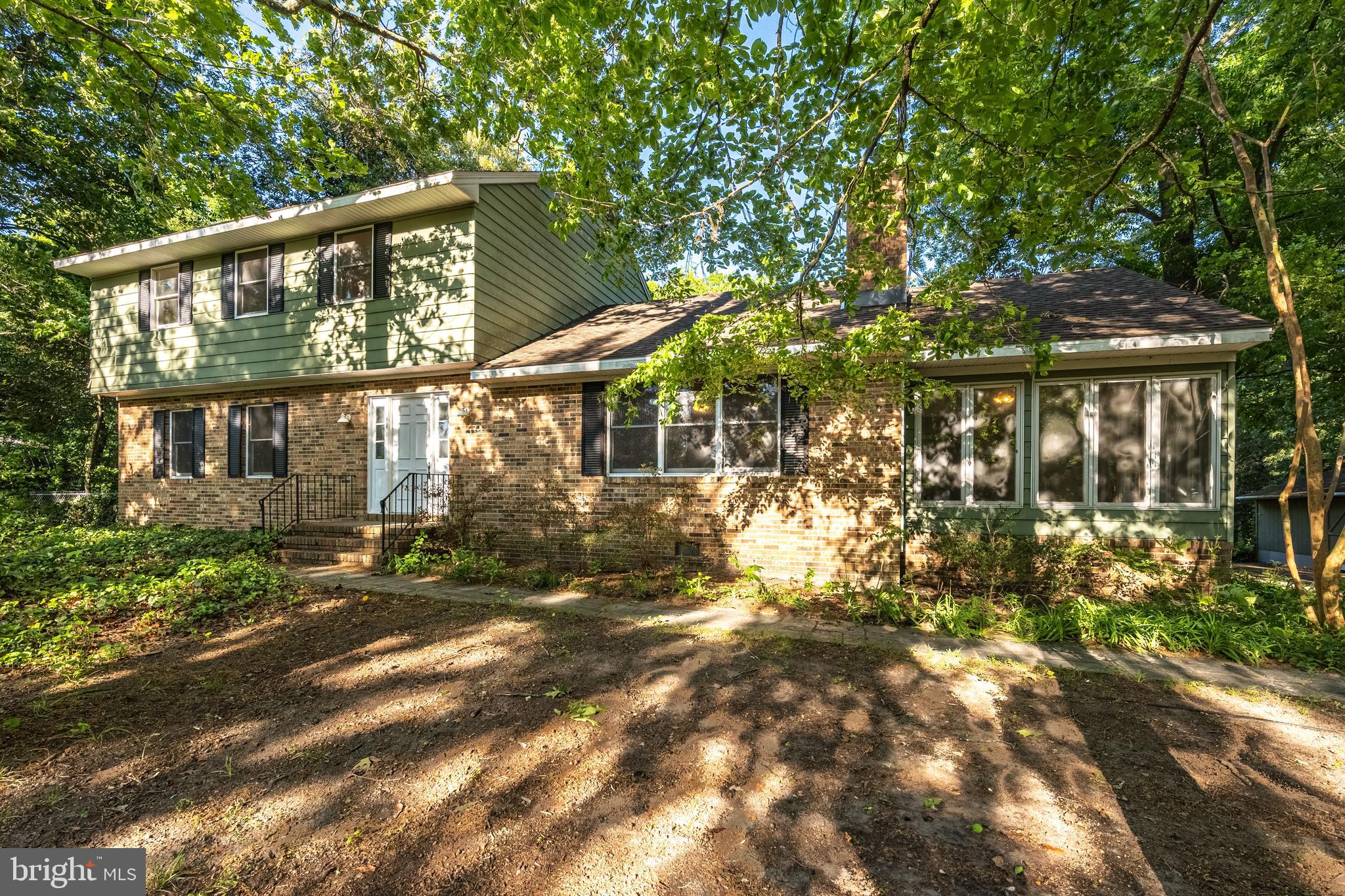 6181 Rockawalkin Road Salisbury, MD 21801 - Photo 2 of 65 a view of a house with a tree in a yard
