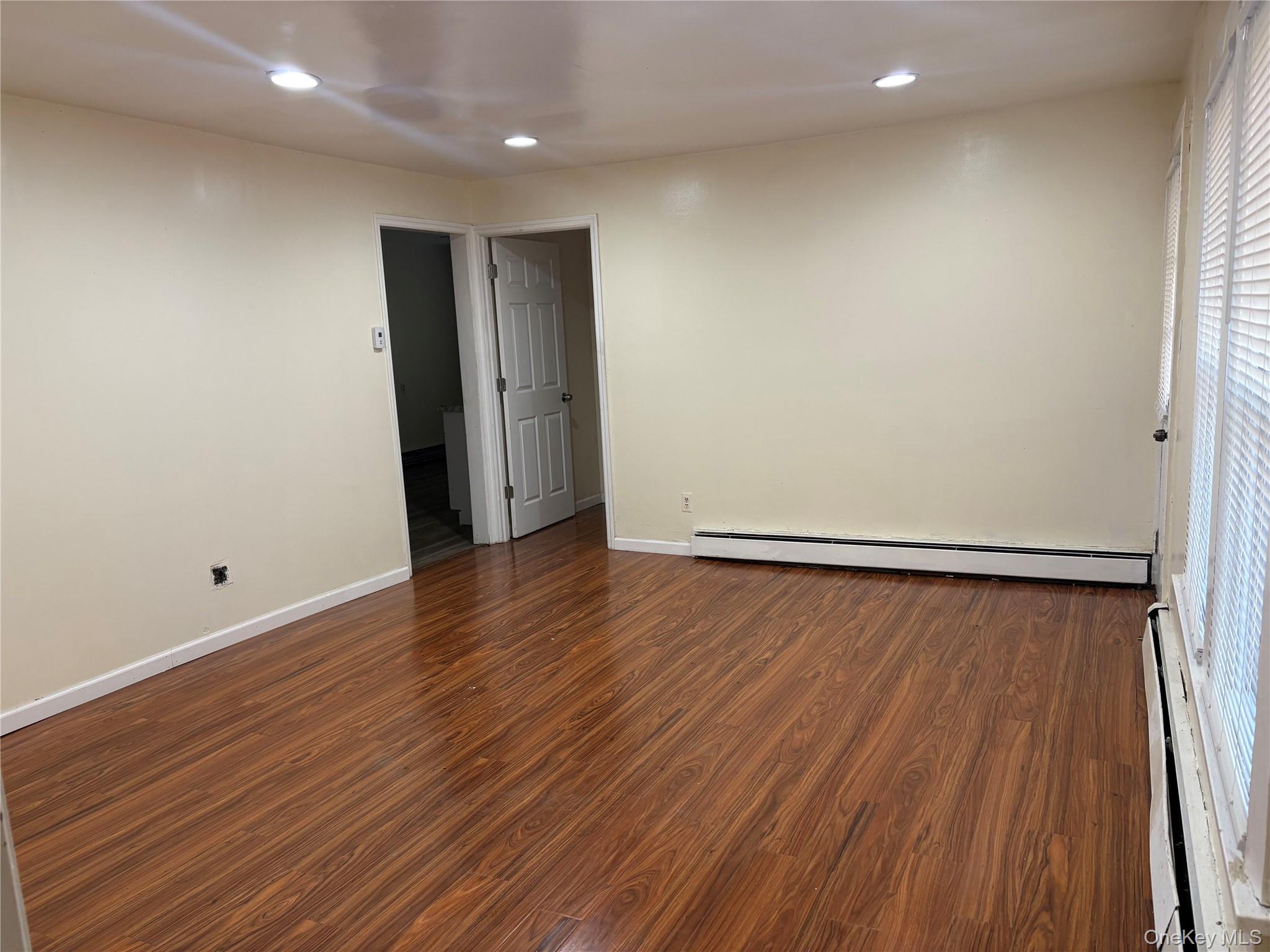 11 Old Turnpike Road Bloomingburg, NY 12721 - Photo 4 of 9 an empty room with wooden floor