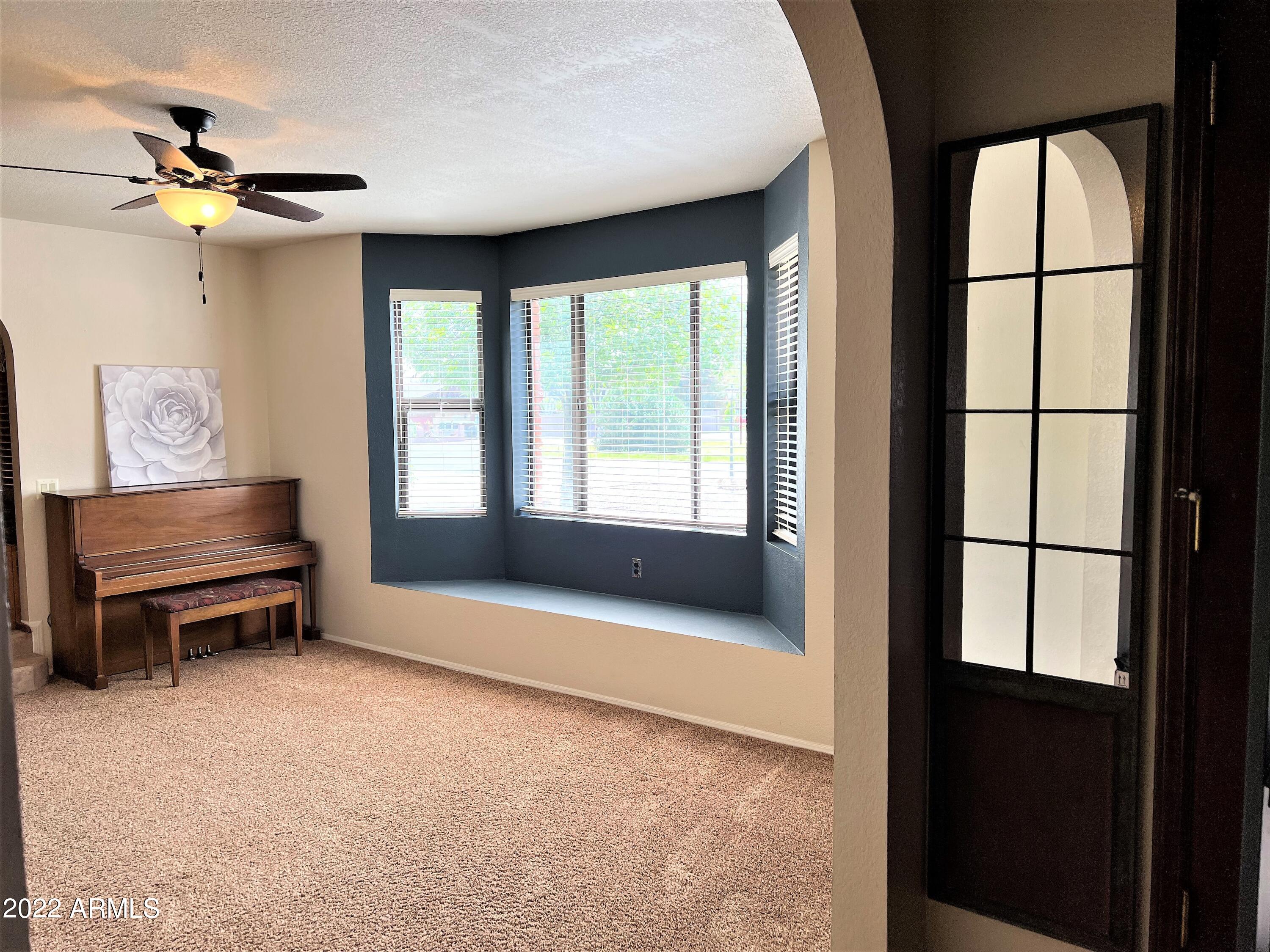 16502 West Magnolia Street Goodyear, AZ 85338 - Photo 13 of 59 a view of an empty room with a window