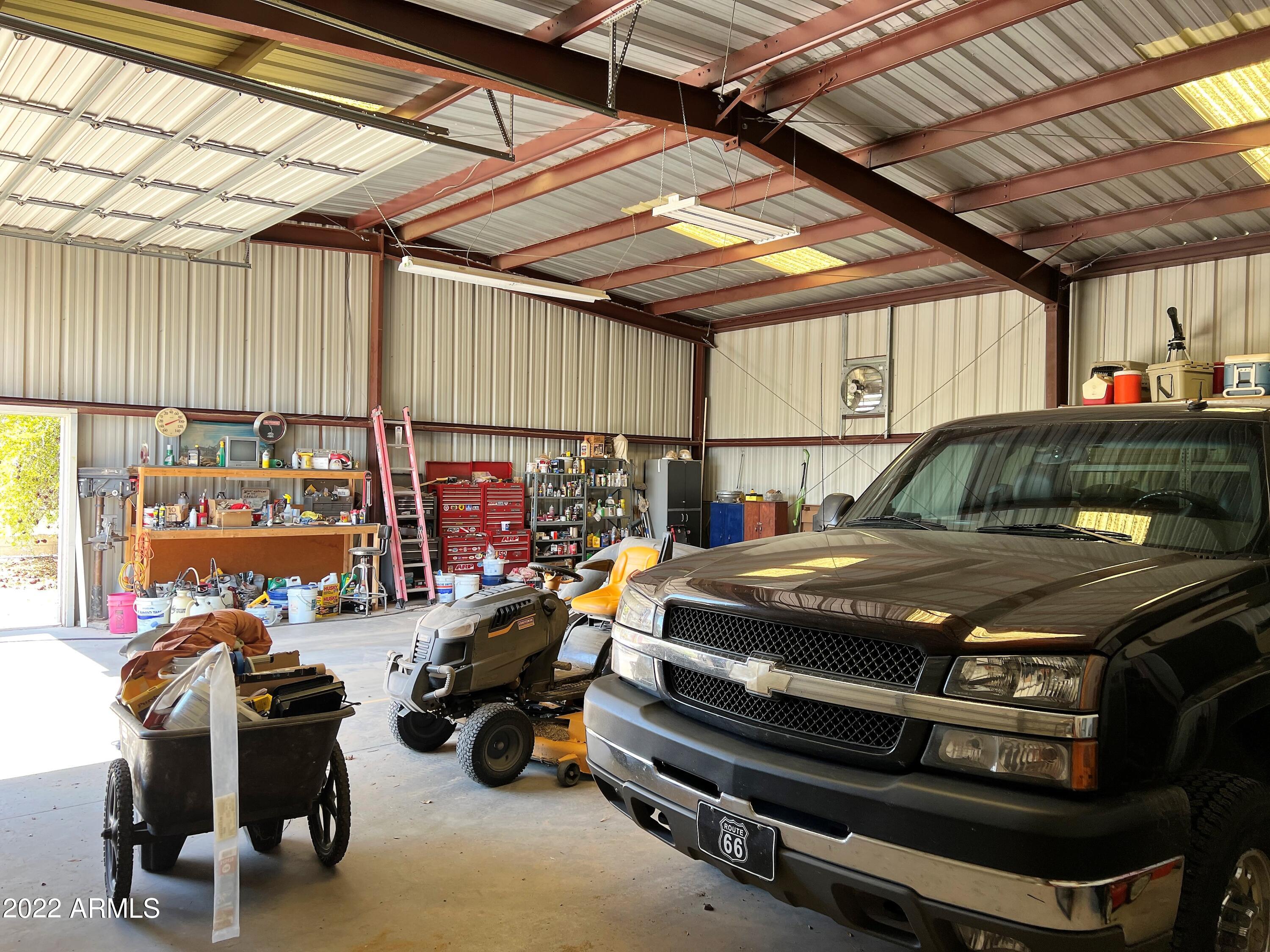 16502 West Magnolia Street Goodyear, AZ 85338 - Photo 15 of 59 a view of a garage with furniture