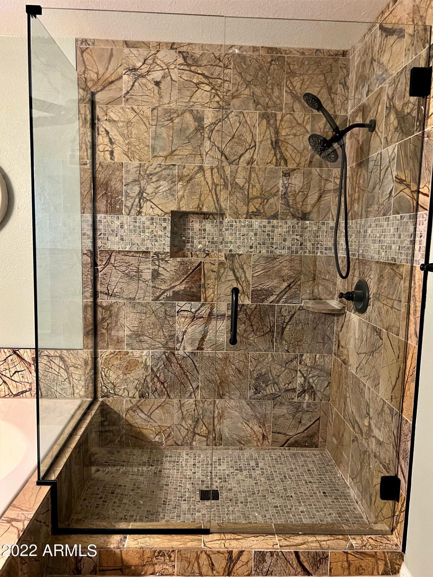16502 West Magnolia Street Goodyear, AZ 85338 - Photo 26 of 59 view of a bathroom shower