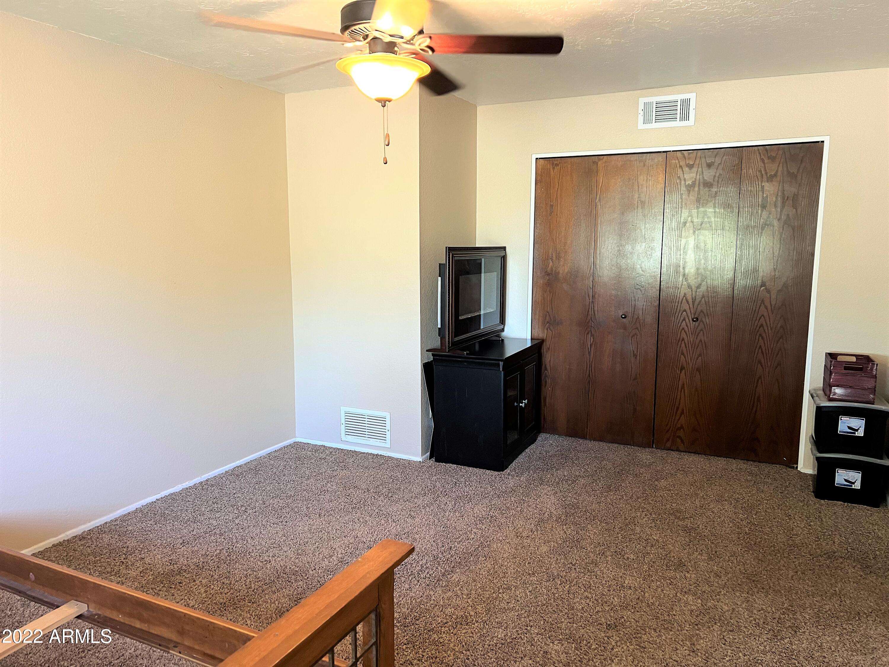 16502 West Magnolia Street Goodyear, AZ 85338 - Photo 37 of 59 a view of a livingroom with a furniture