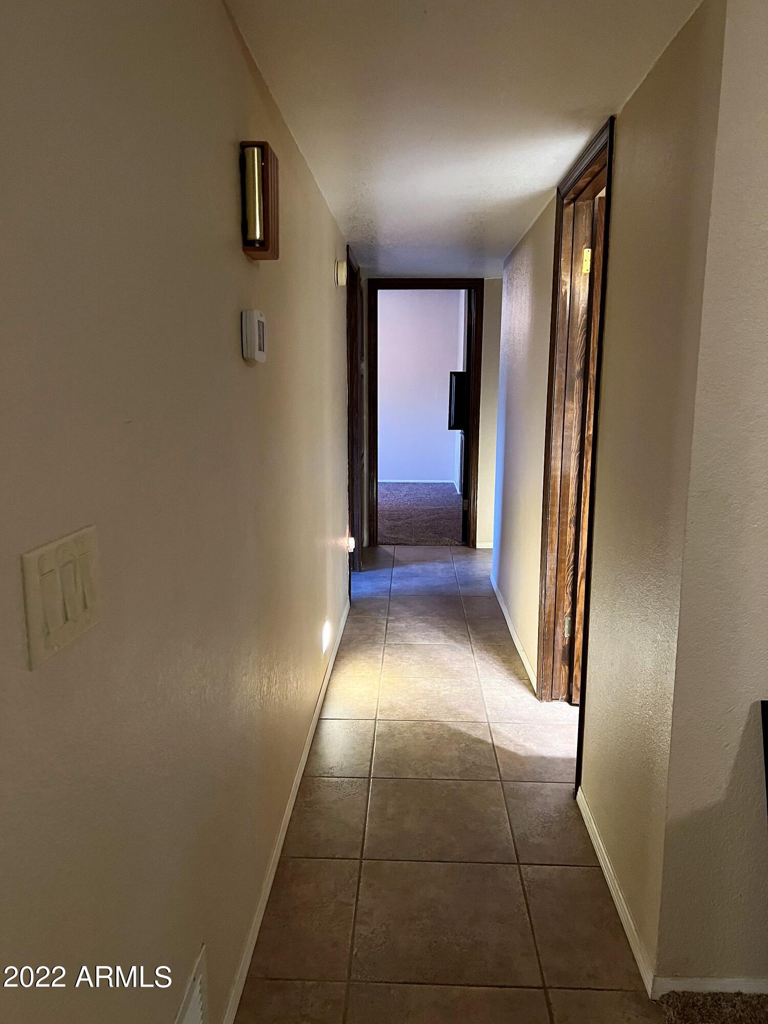 16502 West Magnolia Street Goodyear, AZ 85338 - Photo 38 of 59 Hall to Bedrooms-Bath