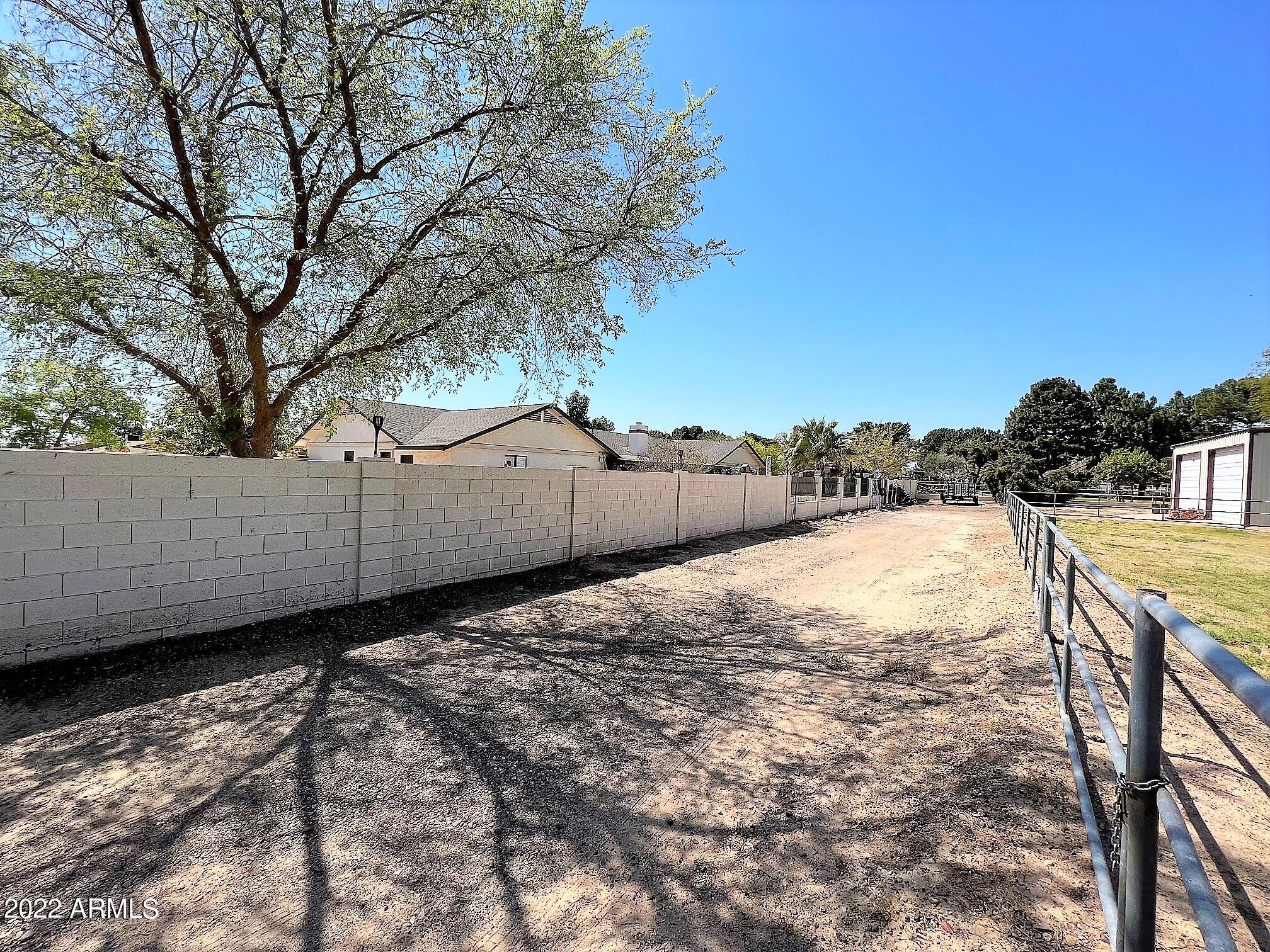 16502 West Magnolia Street Goodyear, AZ 85338 - Photo 49 of 59 a view of a backyard of the house