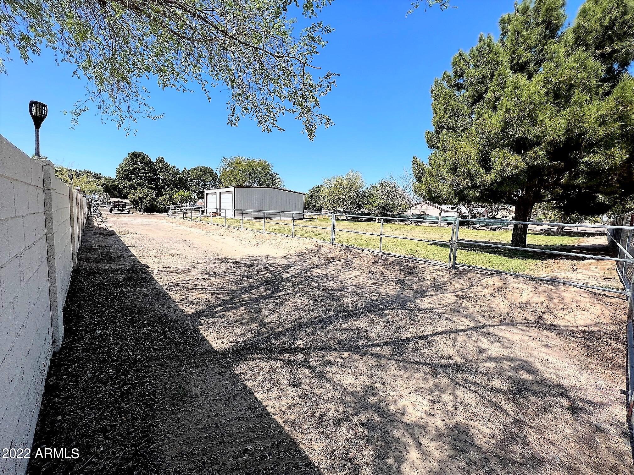 16502 West Magnolia Street Goodyear, AZ 85338 - Photo 50 of 59 a view of an outdoor space and a yard