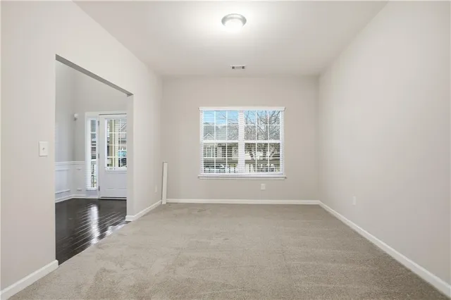 an empty room with windows