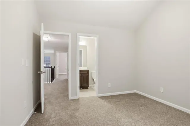 an empty room with a hallway