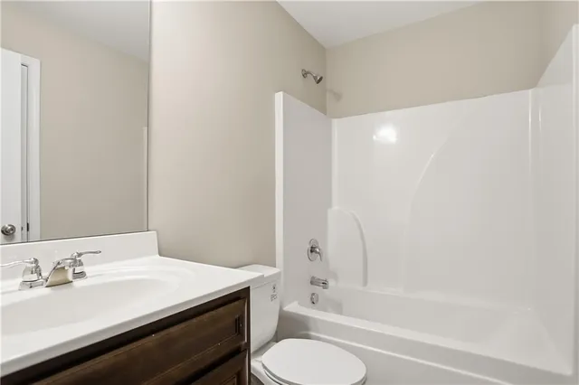 a bathroom with a shower and a bathtub