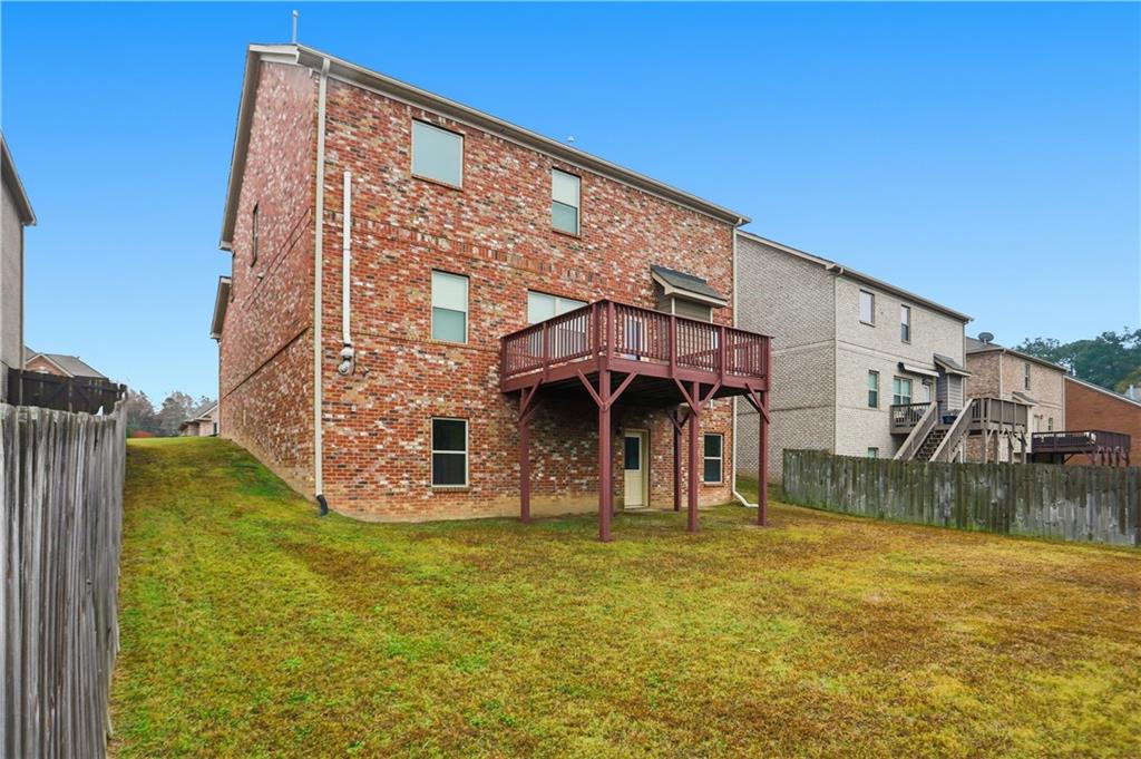 1021 Reddy Farm Lane Grayson, GA 30017 - Photo 22 of 22 a view of a house with yard