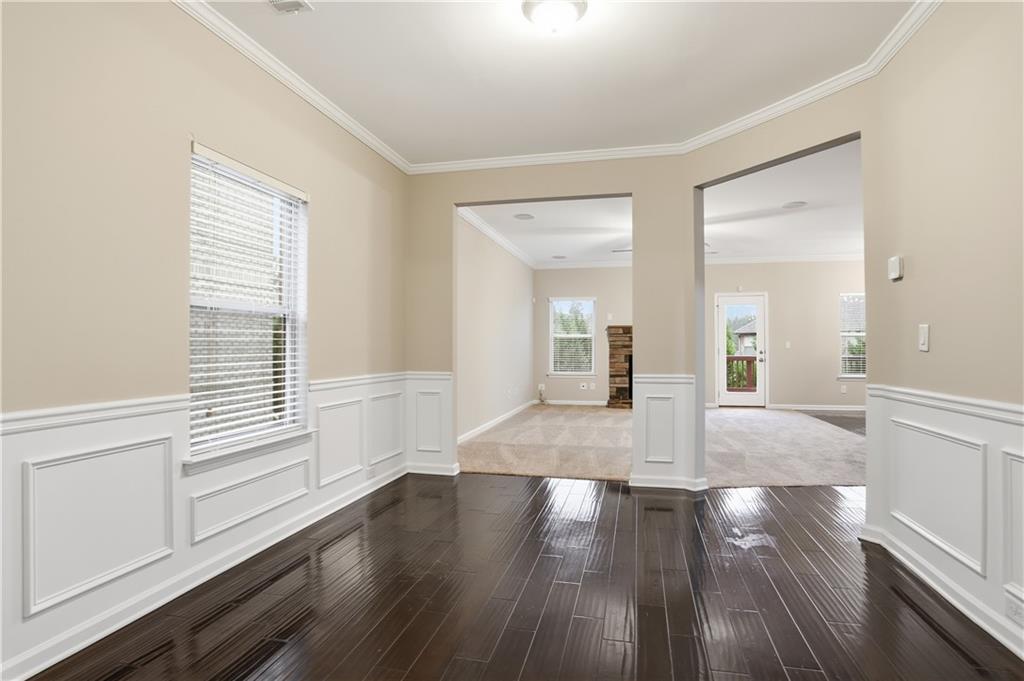1021 Reddy Farm Lane Grayson, GA 30017 - Photo 3 of 22 wooden floor in an empty room with a window