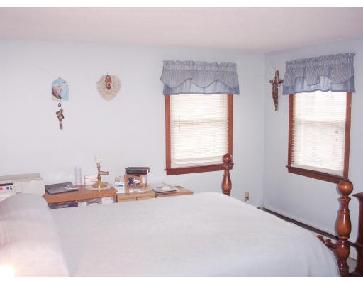 827 Guelphwood Road Southbridge, MA 01550 - Photo 6 of 30 a bedroom with a bed and a window