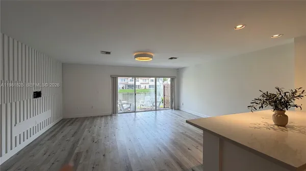 a view of a kitchen and a sink