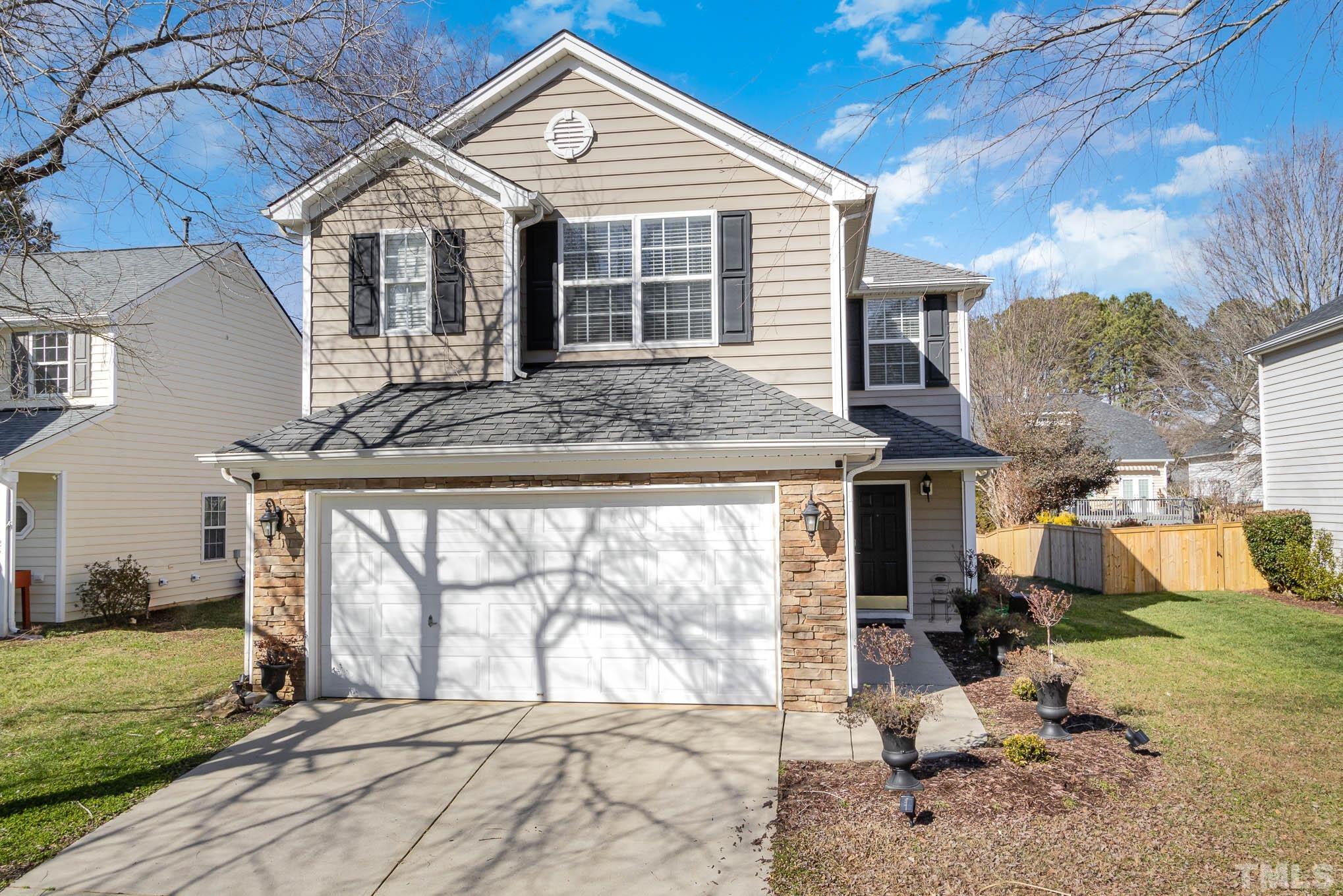 266 Inkster Cove Raleigh, NC 27603 - Photo 2 of 30 a front view of a house with a yard