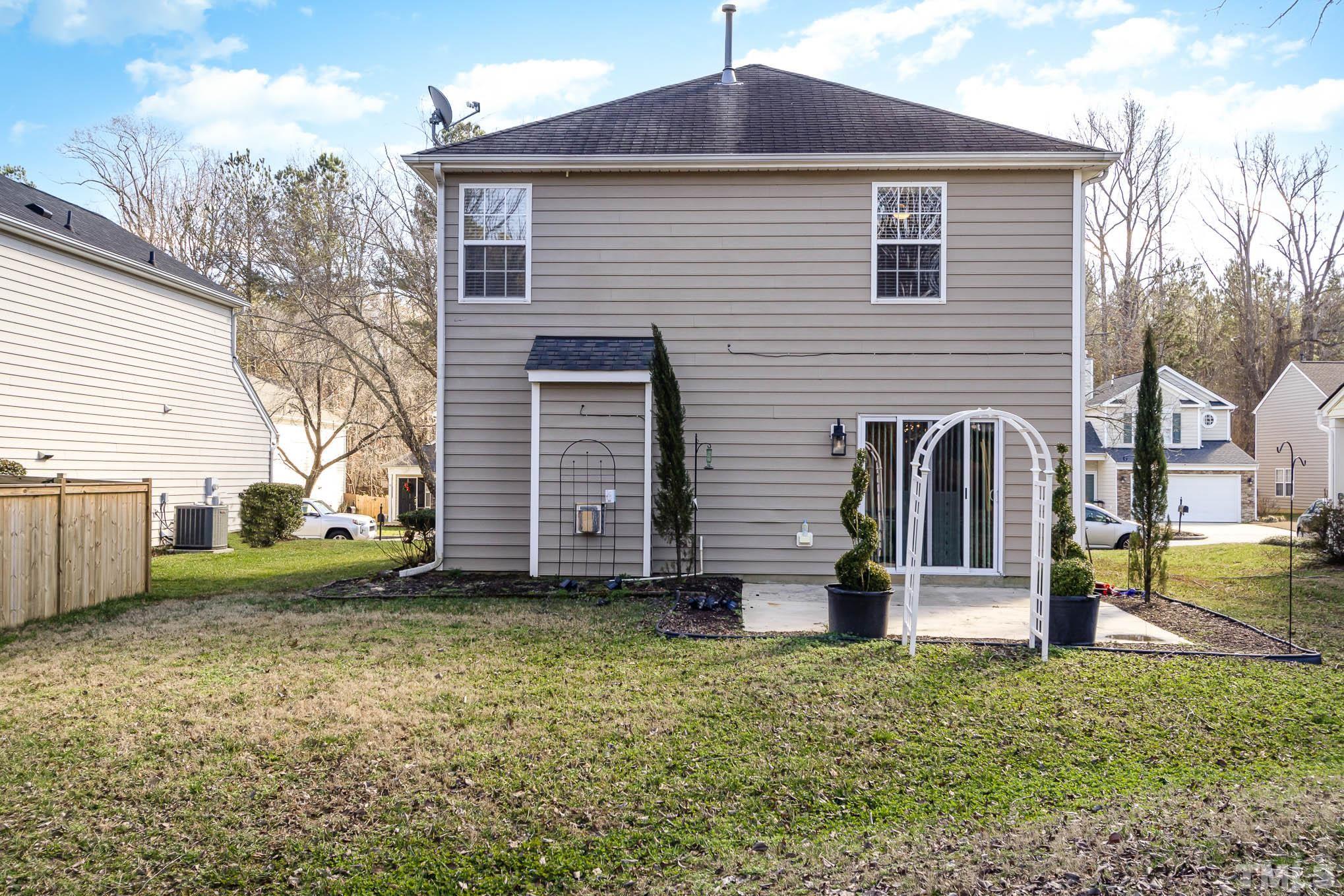 266 Inkster Cove Raleigh, NC 27603 - Photo 25 of 30 a front view of a house with garden