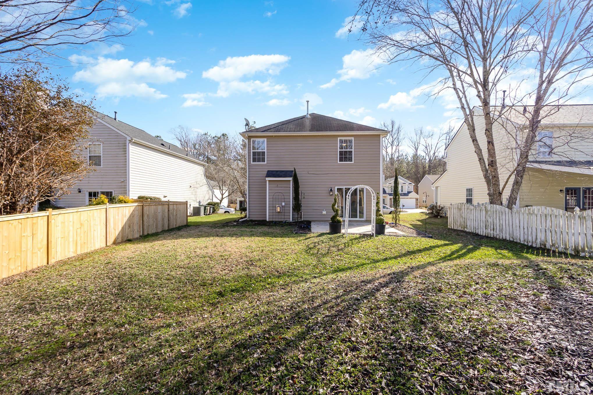 266 Inkster Cove Raleigh, NC 27603 - Photo 28 of 30 a house view with a backyard space