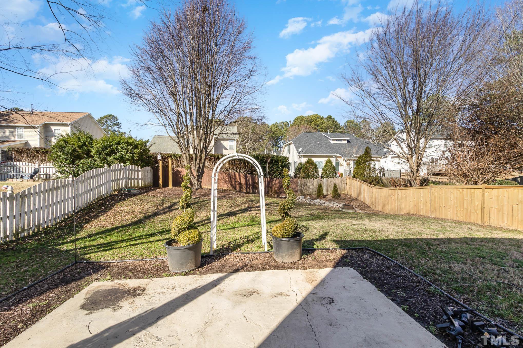 266 Inkster Cove Raleigh, NC 27603 - Photo 29 of 30 a view of a yard with a slide