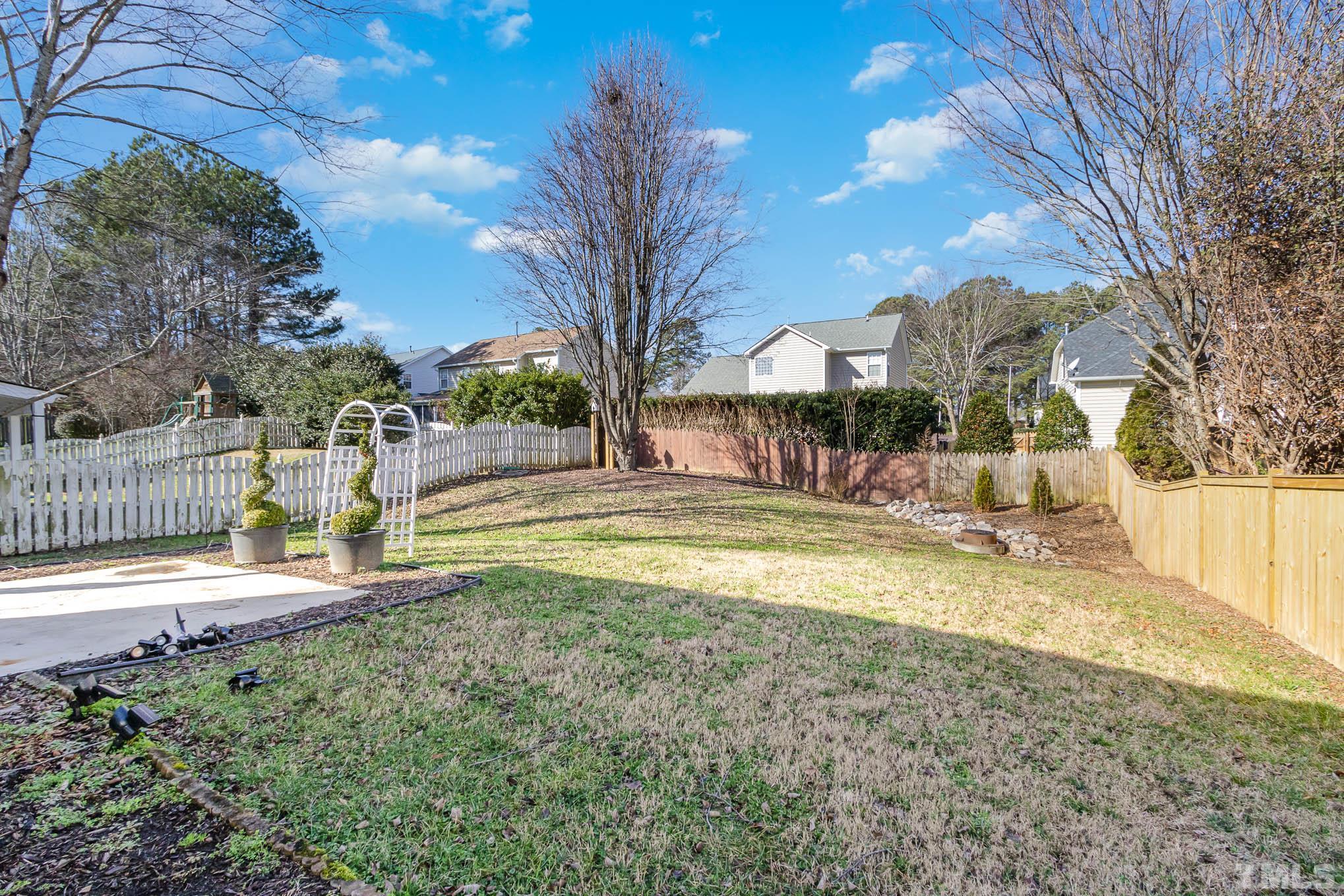 266 Inkster Cove Raleigh, NC 27603 - Photo 30 of 30 a view of yard with a house
