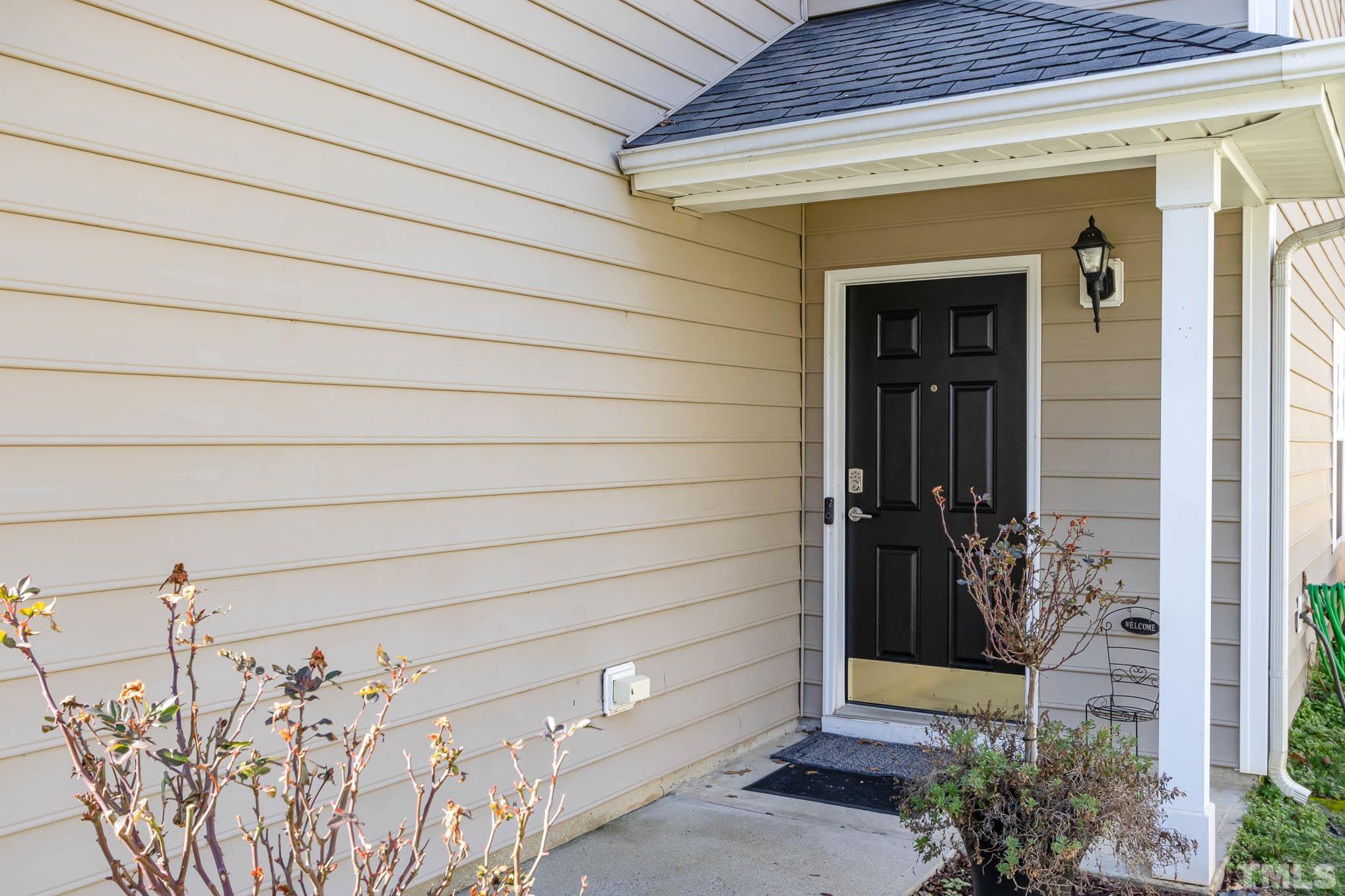 266 Inkster Cove Raleigh, NC 27603 - Photo 3 of 30 a view of a entryway door of the house