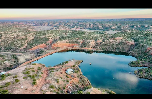 a view of lake and mountain
