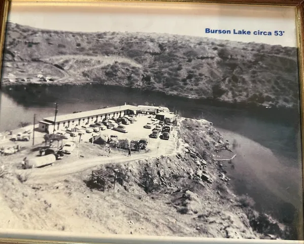 a view of a lake from a balcony