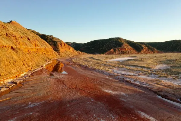 a view of a lake from a yard