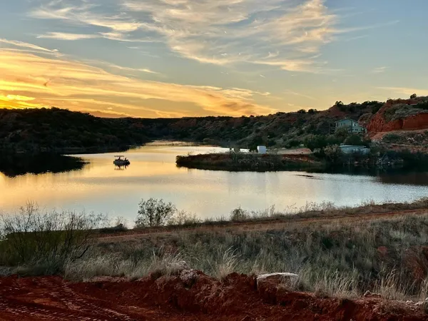 a view of lake with mountain