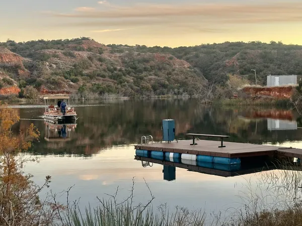 a view of a lake with a mountain
