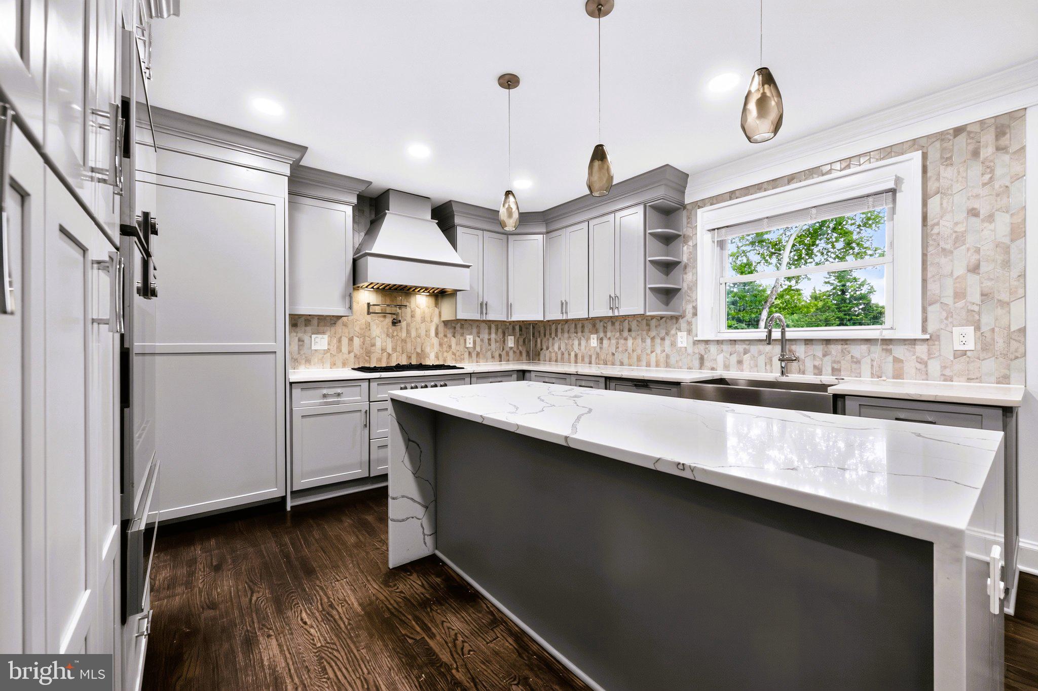 9901 Belhaven Road Bethesda, MD 20817 - Photo 10 of 32 Modern kitchen with elegant finishes.