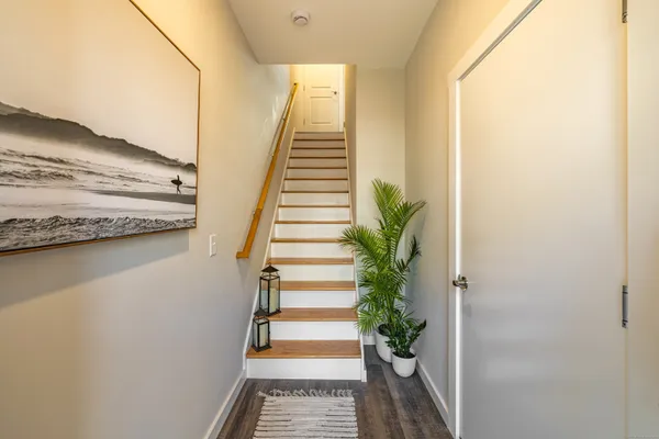 a view of entryway with wooden floor