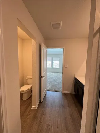 a bathroom with a sink and a toilet