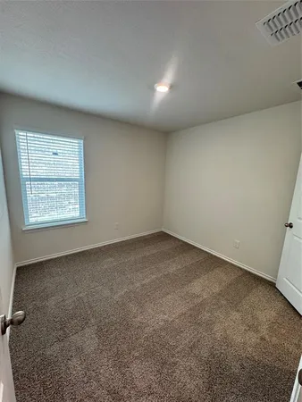 an empty room with a workbench