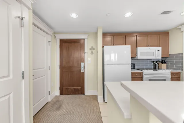 a bathroom with a shower and a sink