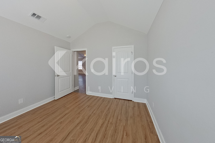 228 Western Red Cedar Drive Springfield, GA 31329 - Photo 12 of 27 a view of empty room with wooden floor