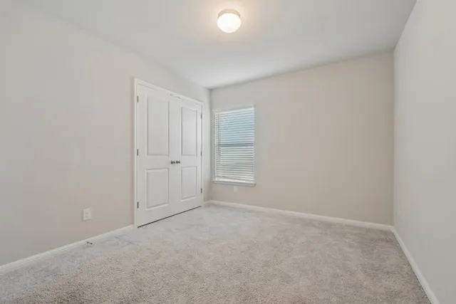 a kitchen with a sink cabinets and stainless steel appliances
