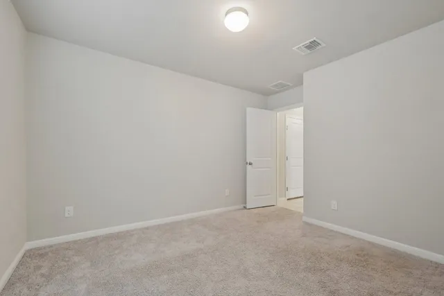an empty room with an entryway