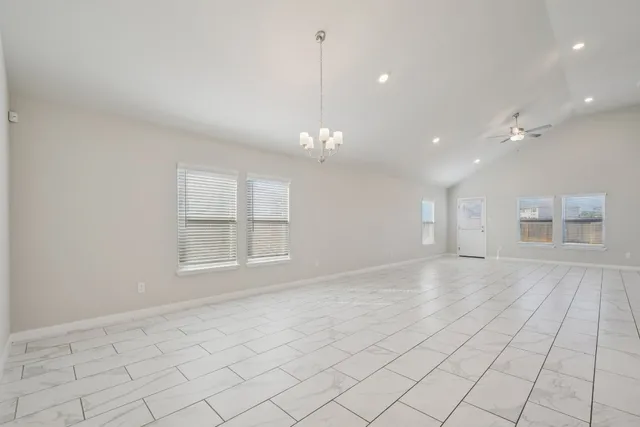 a view of a kitchen with electric appliances