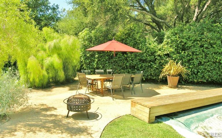 1335 Say Road Santa Paula, CA 93060 - Photo 3 of 18 a view of a swimming pool with a lounge chairs