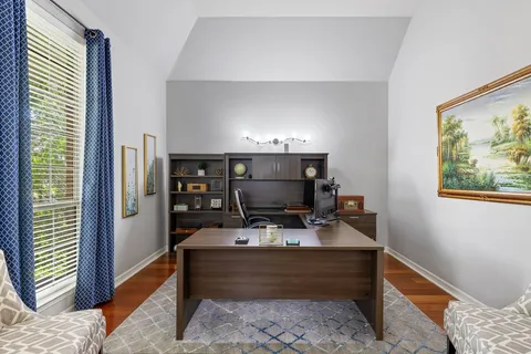 a room with furniture and a window
