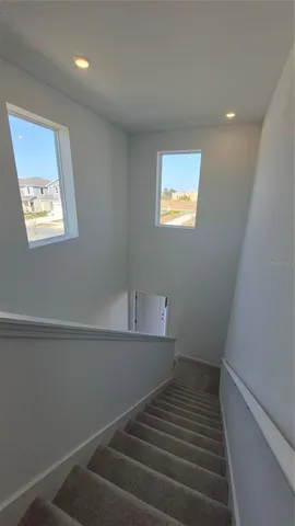 a view of a backyard of the house