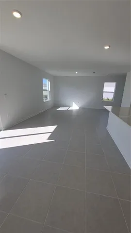 a view of kitchen with cabinets