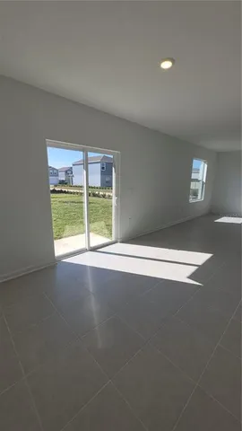 a kitchen with stainless steel appliances a sink stove and cabinets
