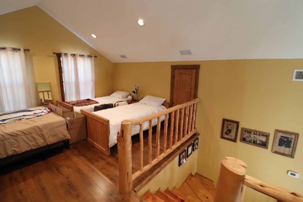 5-6 SD 45125 Rocksprings, TX 78880 - Photo 25 of 28 a bedroom with furniture and a window