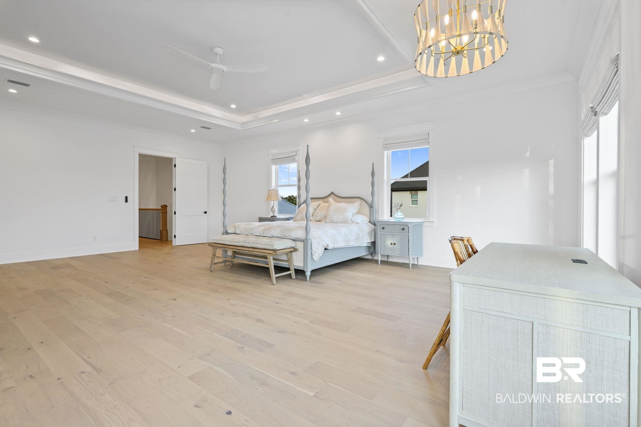 30313 River Road Orange Beach, AL 36561 - Photo 41 of 50 Bedroom featuring light wood finished floors, ornamental molding, a chandelier, and recessed lighting