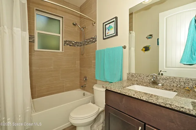 a view of an chairs and table in a patio