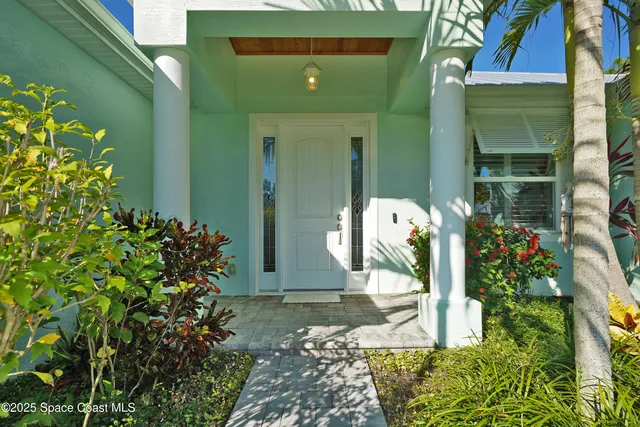 an empty room with wooden floor and closet