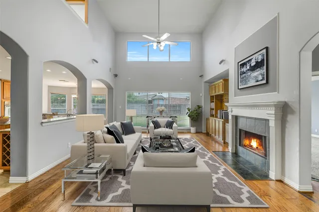a large kitchen with granite countertop a sink counter space cabinets and appliances