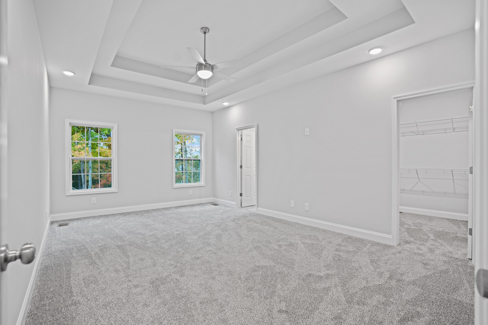 26 Cornerstone Reserves Clarksville, TN 37040 - Photo 13 of 28 an empty room with windows and ceiling fan