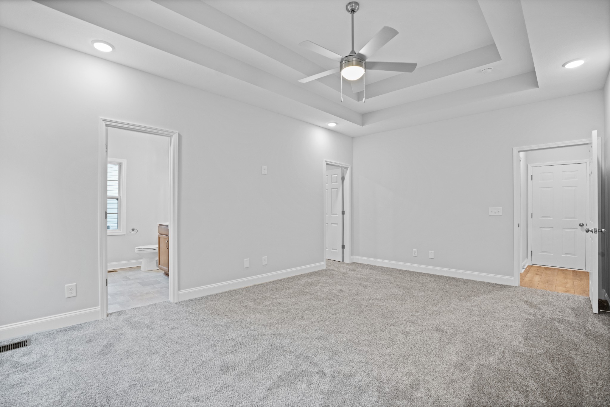 26 Cornerstone Reserves Clarksville, TN 37040 - Photo 14 of 28 an empty room with a ceiling fan and window