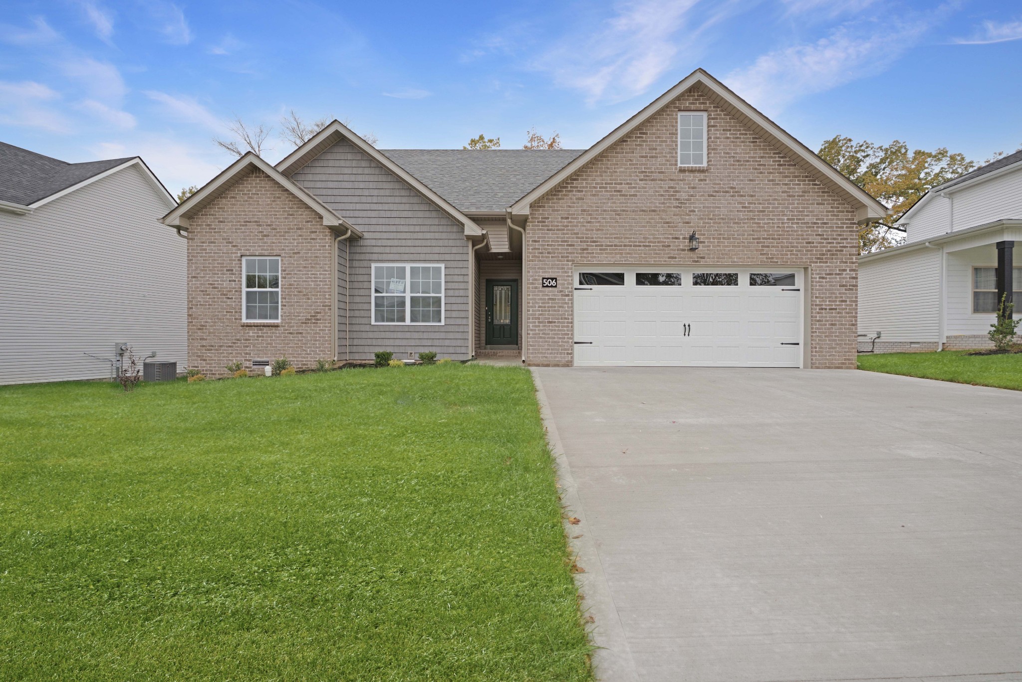 26 Cornerstone Reserves Clarksville, TN 37040 - Photo 2 of 28 a view of a house with a yard and garage