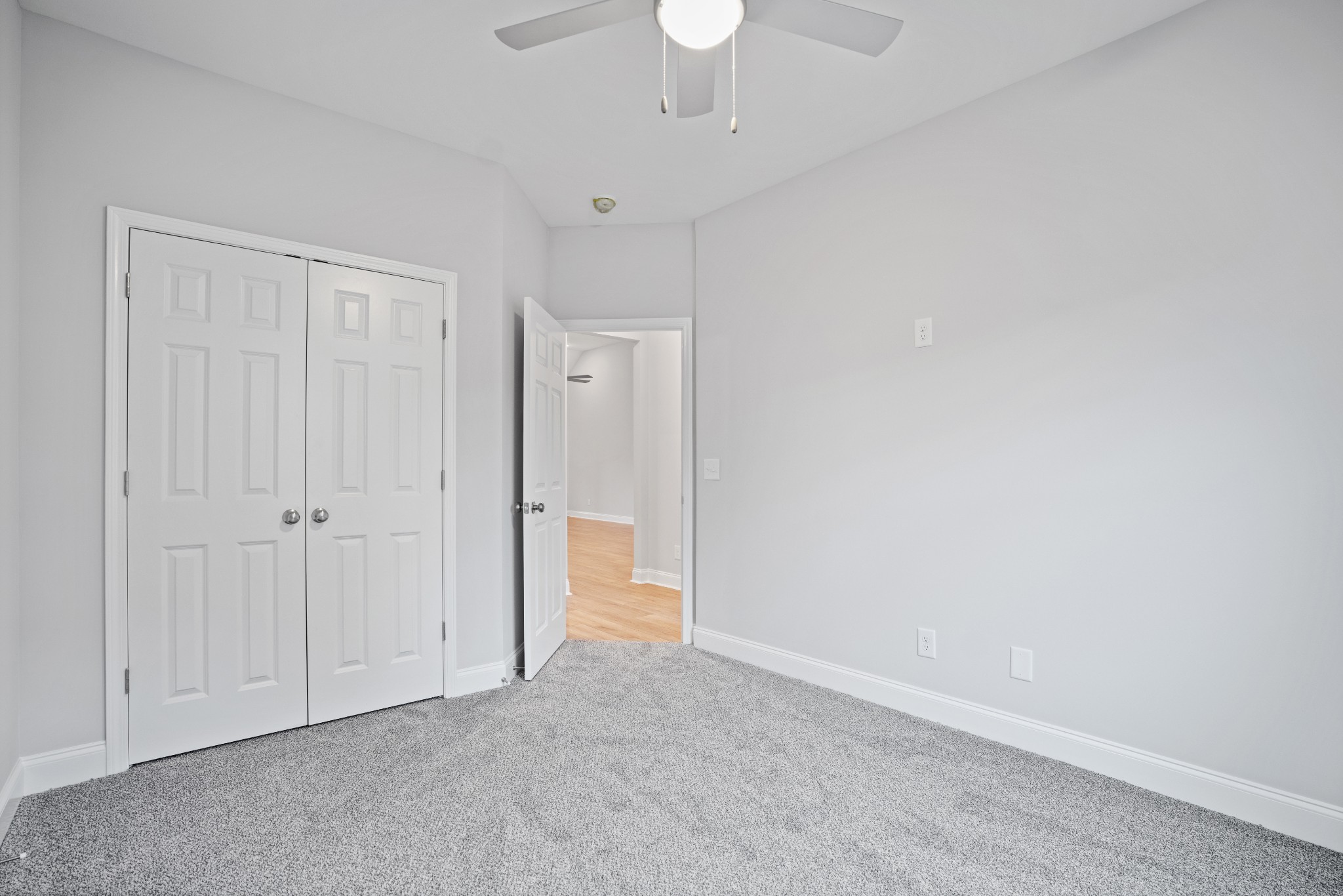 26 Cornerstone Reserves Clarksville, TN 37040 - Photo 22 of 28 a view of an empty room and a chandelier fan